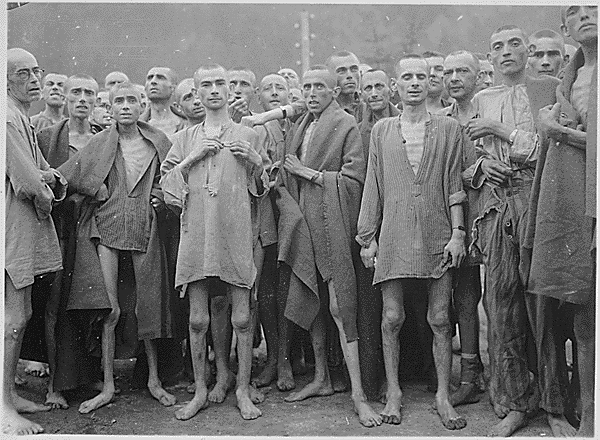 Starved prisoners2C nearly dead from hunger2C pose in concentration camp in Ebensee2C Austria